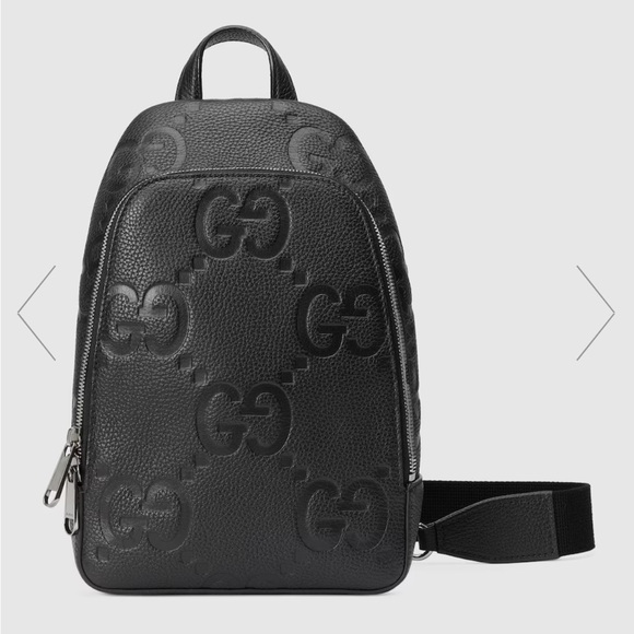 Gucci Handbags - Gucci authentic. Mini jumbo GG crossbody backpack. Never used.